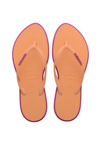 Oranžne gumijaste japonke s vijoličnimi poudarki. Teksturna notranjost, zasnova z zanko in logotip blagovne znamke na zanki. Velikost 37-38.