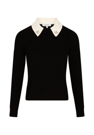 Schwarzer Pullover mit langen Ärmeln, strukturiertem Körper und einem weißen Kragen, der mit dekorativen, mit Edelsteinen besetzten Akzenten verziert ist. Klassischer und taillierter Schnitt.