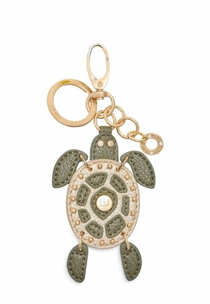 Portachiavi a forma di tartaruga, realizzato in pelle testurizzata verde e beige, con accessori in oro e borchie decorative.