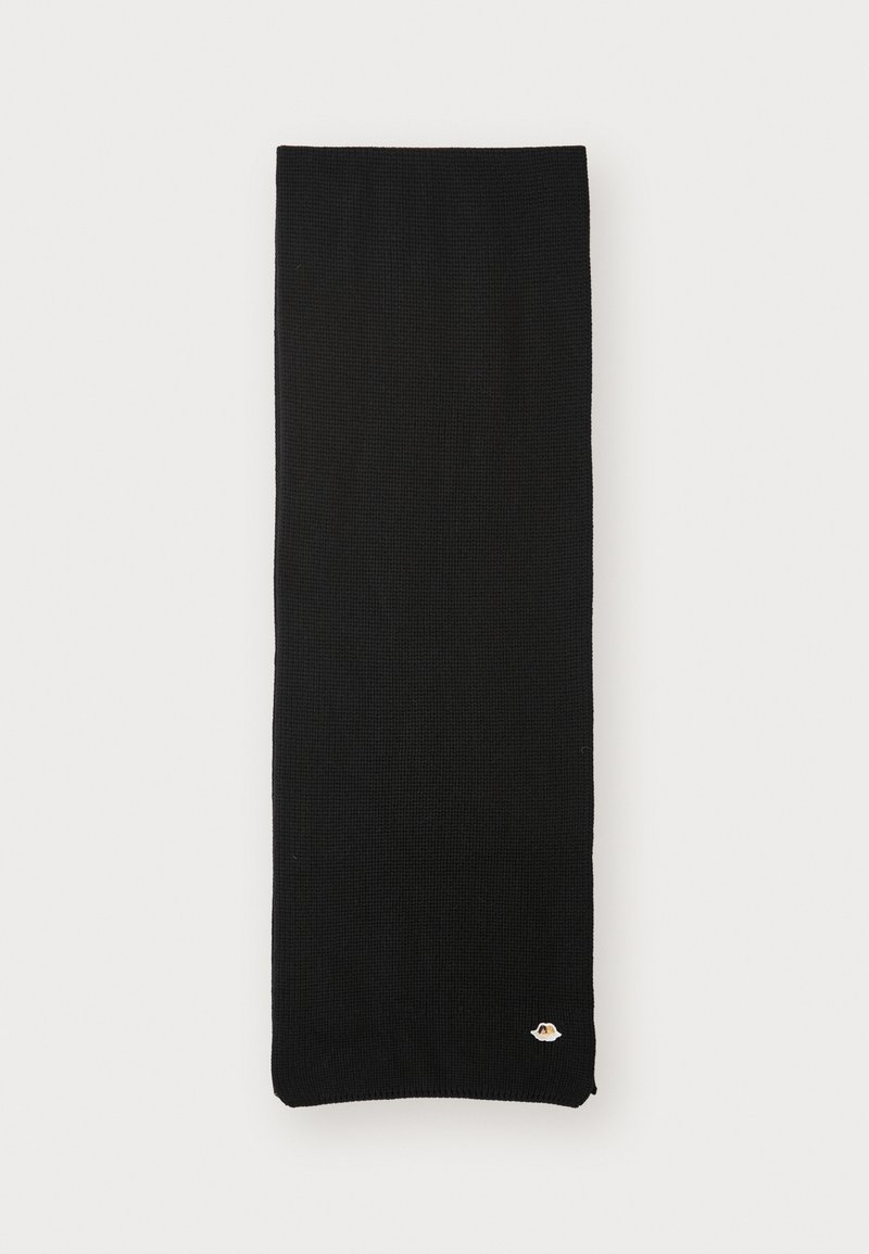 Must-mustritud must sall, millel on tekstuurne mustriga, ja allservas on väike brodeeritud logo. Ristkülikukujuline, siledate servadega.