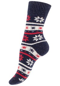 Calzino blu navy con motivi a fiocco di neve bianchi e rossi. Presenta un polsino a coste e un tessuto lavorato testurizzato, dalla forma curvata e con tallone rinforzato.