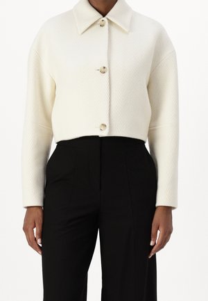 Overgangsjakke - white