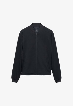 Black zip-up jacket made of soft material, featuring a stand collar, long sleeves, and two side pockets. Smooth texture, minimal design.