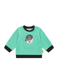 Sudadera de manga larga verde menta con puños y dobladillo en negro. Presenta un oso bordado con un gorro a rayas y detalles del logotipo. Botones en el hombro.