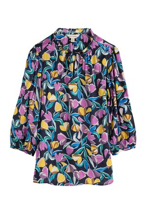 Floral blouse in dark fabric with purple, yellow, and green patterns. Features puff sleeves and a ruffled neckline. Lightweight material.