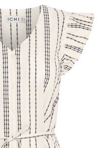 Abito bianco con strisce nere, chiusura con bottoni e maniche corte a balze. Presenta una vita con cintura e un motivo a linee verticali.