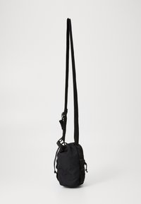 Columbia TRAIL TRAVELER™ WATER BOTTLE SLING UNISEX - Borsa a tracolla - black