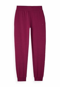 Burgunderfarbene Jogginghose mit breitem Bund, schmal zulaufenden Bündchen und einem glatten, texturierten Stoff. Dezentes Logo-Detail an der Seite.