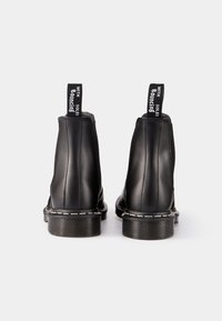 Dr. Martens Šněrovací kotníkové boty - black