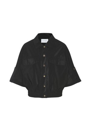 Black cropped jacket with wide sleeves, snap buttons down front, two chest pockets, and elastic waistband.