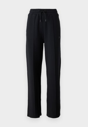 Black sweatpants with a relaxed fit, elastic waistband, adjustable drawstring, and vertical seams along the legs. Soft fabric texture.