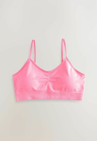 Rosa bralette tillverkad av glänsande material med tunna justerbara band. Har en slät yta och en subtil mittsöm detalj.