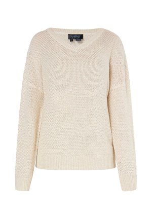 Beżowy sweter z dzianiny z dekoltem w serek, długimi rękawami oraz prążkowanymi mankietami i dołem, z metką "usha BLACK LABEL", rozmiar mały.