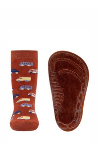 Rust-colored children's socks with blue and yellow car patterns, one showing the front and the other the textured non-slip sole.