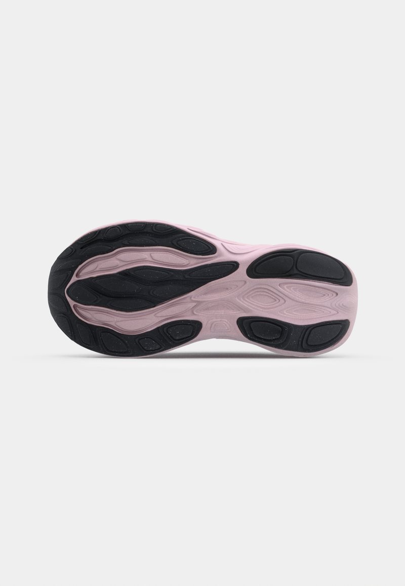 Semelle de chaussure présentant un design sculpté, principalement en rose clair avec des accents noirs. Caoutchouc texturé pour une meilleure adhérence et flexibilité.