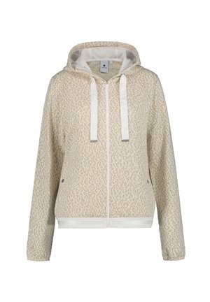 Ljus beige zip-up hoodie gjord av texturerat tyg med ett subtilt djurmönster. Har en huva, vita snören samt elastiska ärmslut och nederkant.