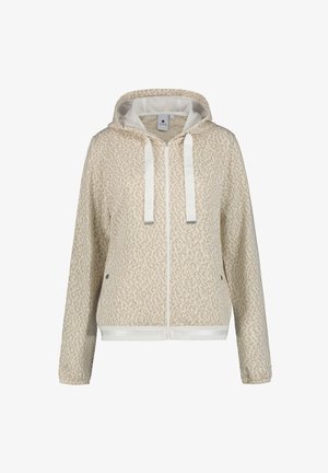 Ljus beige zip-up hoodie gjord av texturerat tyg med ett subtilt djurmönster. Har en huva, vita snören samt elastiska ärmslut och nederkant.