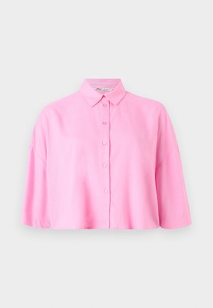 Pink short-sleeve button-up shirt with a pointed collar and a relaxed fit. Made of lightweight fabric with a smooth texture.