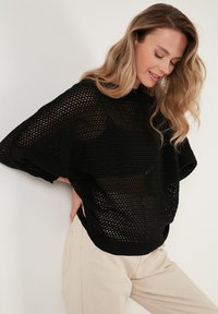 LELA Pulóver - black
