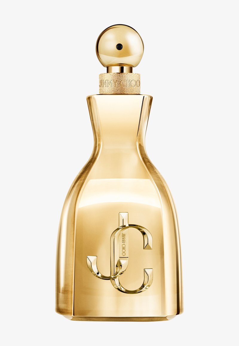 Goldene, sanduhrförmige Parfümflasche mit kugelförmigem Verschluss und eingraviertem "JC"-Logo auf der Vorderseite, das Licht auf einem weißen Hintergrund reflektiert.