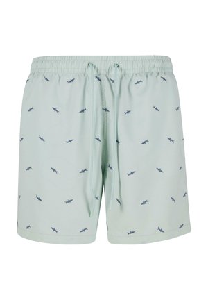 Gaiši miинt пeldēšanas šorti ar elastīgu auklu jostu, ar maziem tumši ziliem haizivju rakstiem visā virsmā. Izgatavoti no mīksta, ātri žūstoša materiāla.