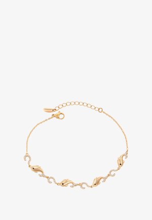 Kultaketju rannekoru, jossa on neljä delfiinin muotoista riipusta ja pieniä timanttipäällysteisiä aalto-linkkejä. Rannekorussa on lukkona hummerilukko ja säädettävä ketju.