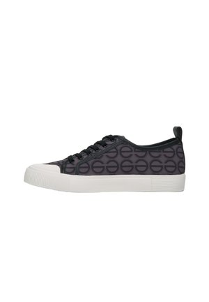 Czarne sneakersy z powtarzającym się wzorem w kółka, gumową podeszwą, białymi akcentami, sznurowanym zapięciem oraz tylną pętlą do łatwego zakładania.