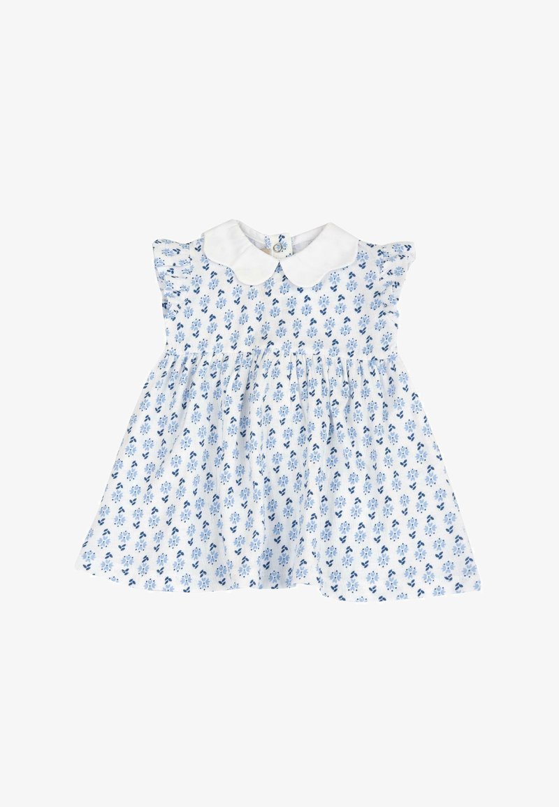 Robe blanche avec imprimé floral bleu, manches courtes à volants et col Peter Pan. Fermeture à boutons dans le dos. Tissu en coton doux.