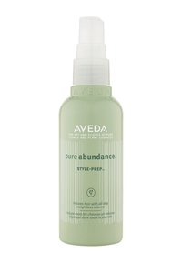 Aveda Style-Prep sprayflaska, cylindrisk, mat ljusgrön med vita vertikala ränder och pump-sprayare; märkt med produktinformation.