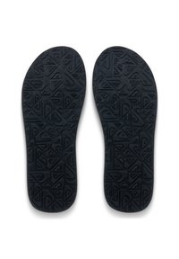 Μαύρες εσωτερικές σόλες με υφή που παρουσιάζει γεωμετρικά μοτίβα και κυματιστό σχέδιο, κατάλληλες για διάφορους τύπους υποδημάτων.