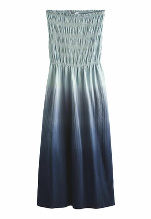 Strapless maxi dress with smocked bodice, textured fabric, and gradient color fading from light gray-blue at top to dark navy at hem.
