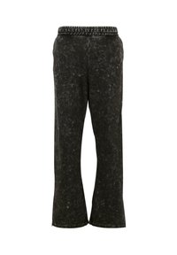 Svarta, vida byxor med en texturerad yta och resår i midjan. Har en sidopanel med en subtil, mönstrad detalj.