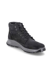 Stivali neri alla caviglia in suede con fodera morbida, dotati di lacci tondi, occhielli in metallo, suola in gomma grigia e senza motivi visibili.