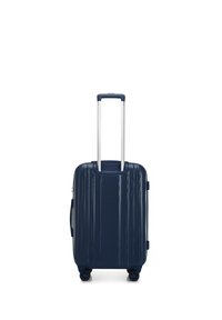 Marineblauwe hardshell koffer met verticale ribbels, uitschuifbare aluminium handgreep, vier zwarte wielen en een zijhandgreep.