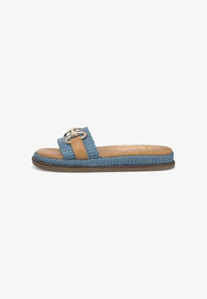 Blue woven slide sandal with tan leather accents, a flat sole, and a double metal buckle detail on the strap.
