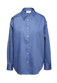 Blå skjorta med lång ärm i slät tyg, med klassisk krage, knappar fram och avslappnad passform. Har skräddarsydda axlar och manschetter.