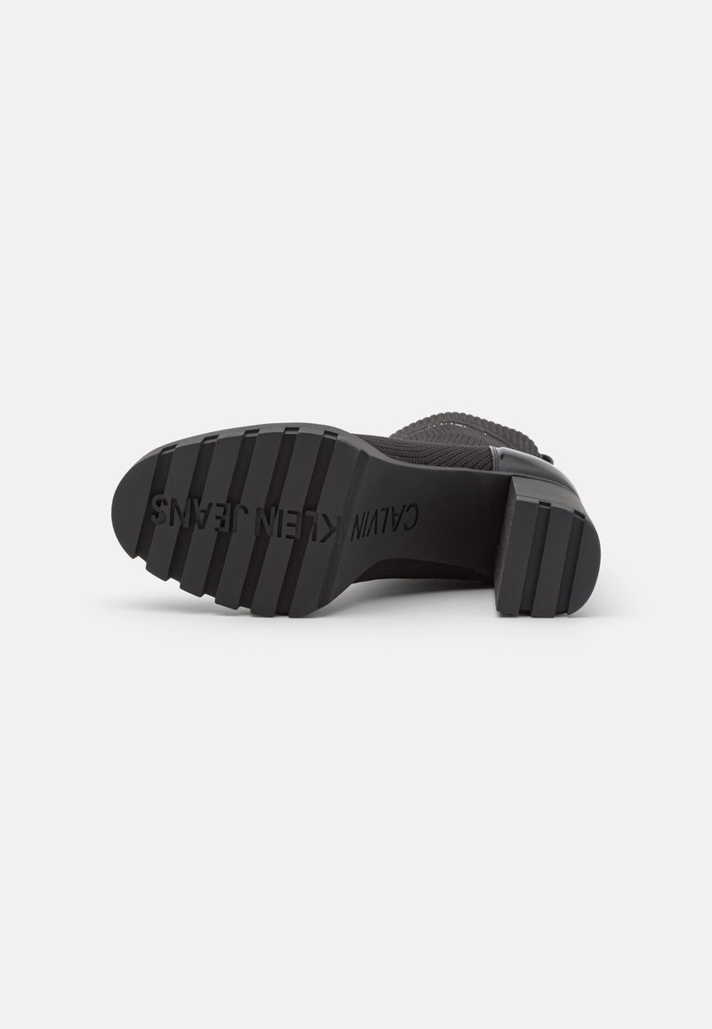 calvin klein jeans platform knit sock boots in black