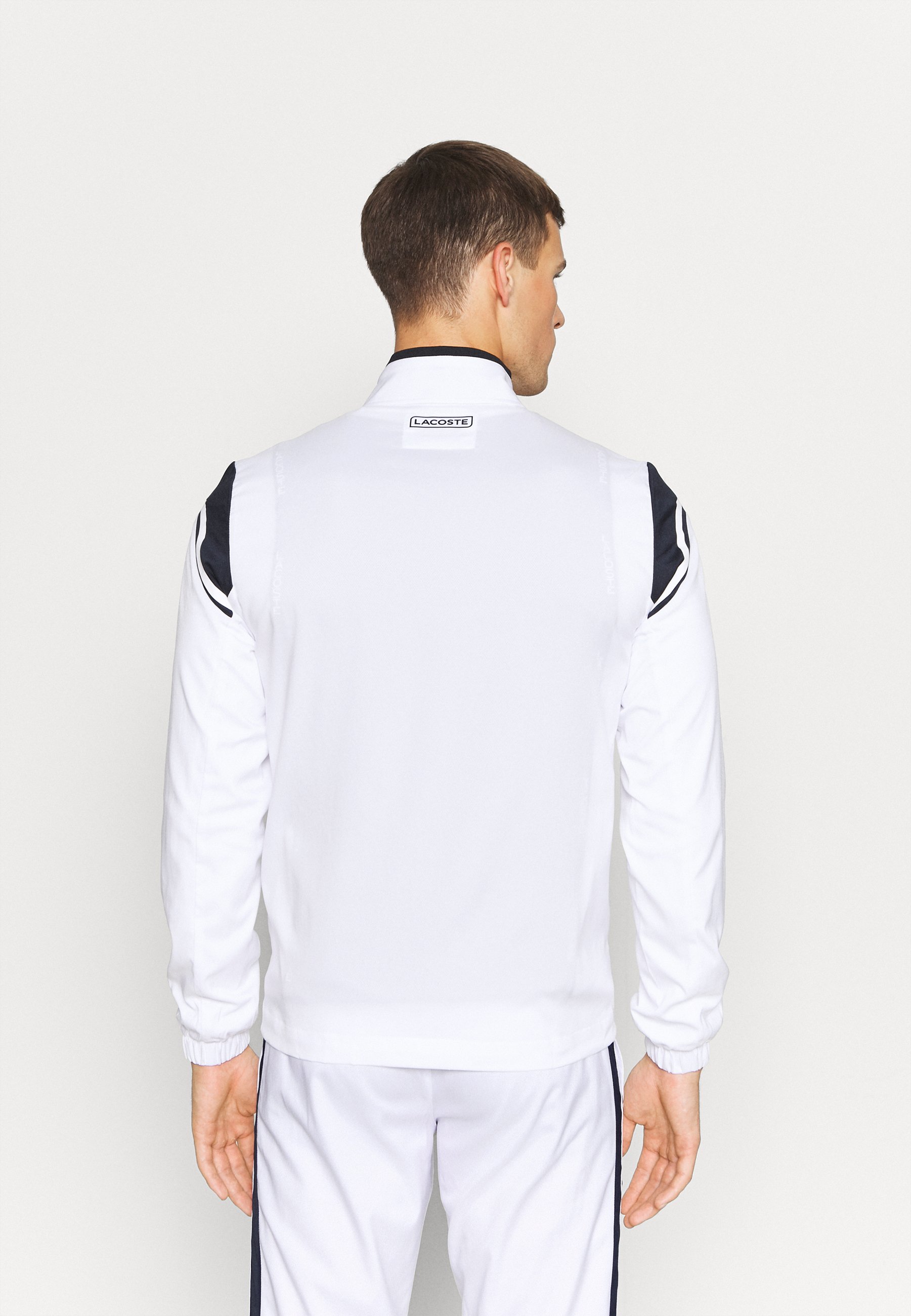Lacoste Sport TRACKSUIT - Tuta - blanc / bleu marine/bianco - Zalando