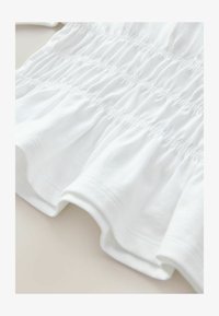 Sélectionné, white