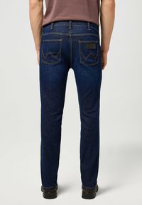 Wrangler GREENSBORO - Straight leg jeans - rustic navy