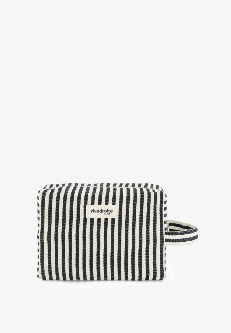Trousse en tissu rectangulaire à rayures verticales noires et blanches, avec une poignée sur le côté et une étiquette "rivedroite PARIS" sur le devant.