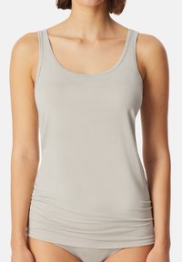 Light gray tank top, sleeveless with a rounded neckline, made of smooth fabric. Features gathered texture at the waist for a fitted look.