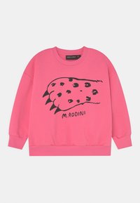Rosa sweatshirt med svart klor grafik och fläckar. Har ribbade ärmslut och nederkant. Varumärket "M. Rodini" tryckt under designen.
