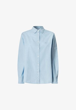 Hele sinine, pika varrukaga nööpidega särk, mis on valmistatud pehmest kangast. Omab klassikalist kraed, ees nuppe ja diskreetset õmbluse detaili.