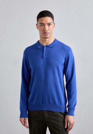 Bright blue long-sleeve polo sweater made of soft knit fabric; features a collar, five-button placket, and ribbed cuffs and hem.