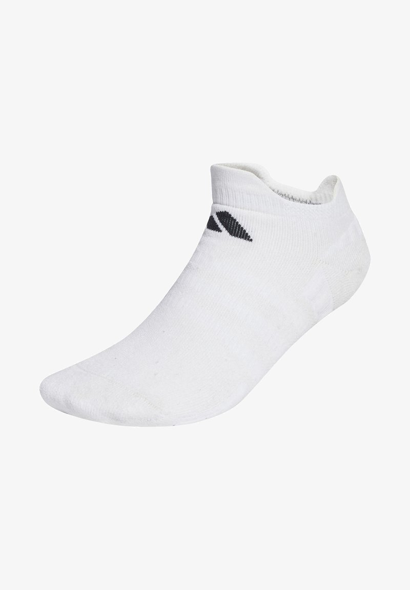 White ankle sock made of breathable fabric with a textured finish. Features black logo accents and a snug fit around the ankle.