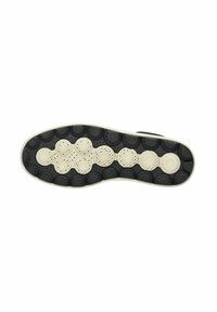 Semelle en caoutchouc noir avec un motif texturé de grips circulaires et des accents blancs. Le design présente des couleurs contrastantes et des sections surélevées pour l'adhérence.