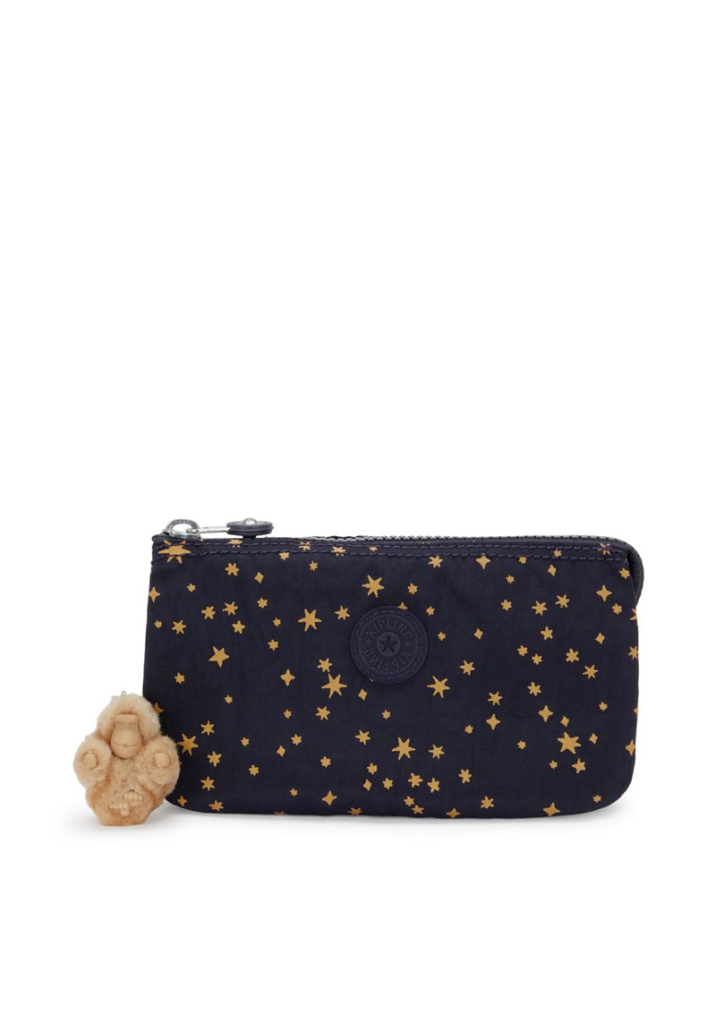 Navy fabric wallet with gold star pattern, zip closure, and logo emblem. Includes a tan decorative charm in a seated position.
