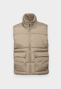 Beige puffer vest with high collar, front zip, and two buttoned chest pockets; quilted texture offers warmth and insulation.