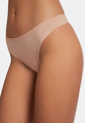 Beige underwear with a soft texture, featuring a low-rise design, delicate stitching, and minimal coverage. Smooth finish on edges.